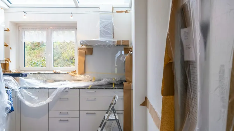 Kitchen renovation with white cabinets — stock photo