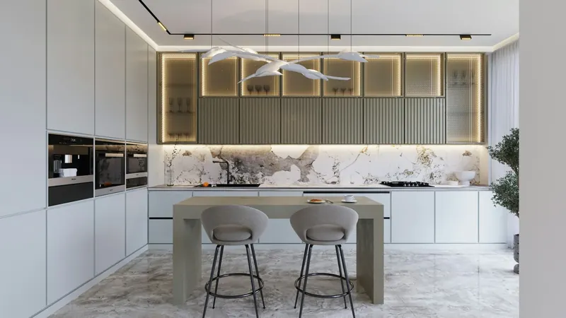 A modern kitchen with marble counter tops and stools — stock photo