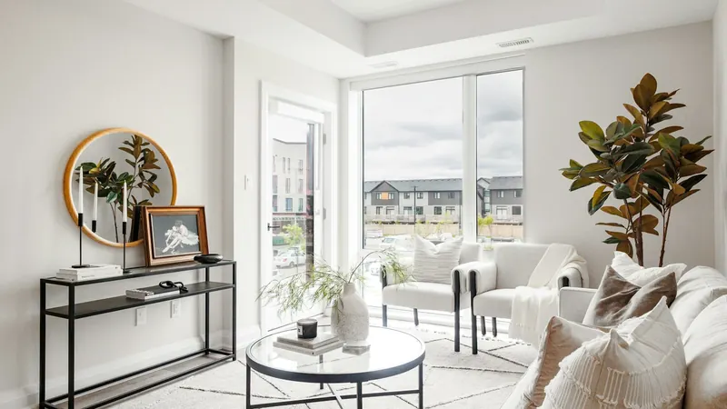 Modern living room with minimalist decor and large window — stock photo